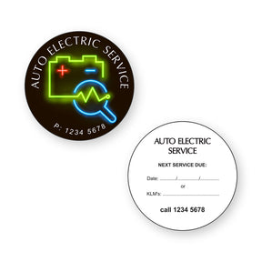 Auto Electric Reminder Stickers showing front and reverse sticker designs