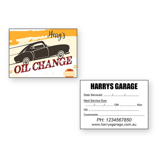 100 x Oil Change Service Sticker showing front and reverse sticker designs